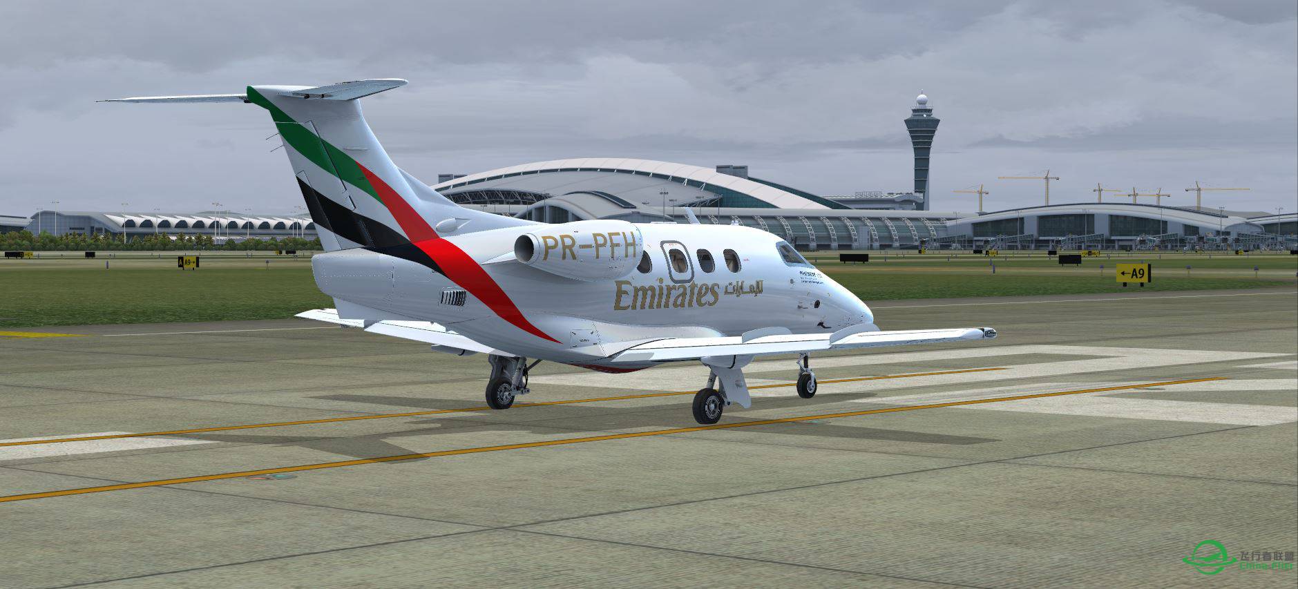 Phenom 100 Emirates @ ZGGG-5945 